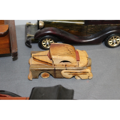 572 - Collection Of Wooden Vehicles Inc A Wooden Bike Puzzle 
Longest-37cm