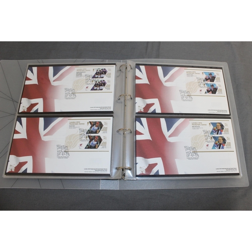 166 - London 2012 Gold Medal Winners Stamp Collectors Packs in Album