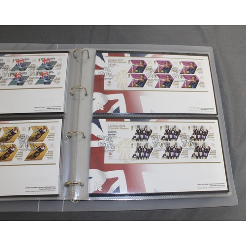 167 - London 2012 Team GB Gold Medal Winners Stamp Collectors Packs in Album