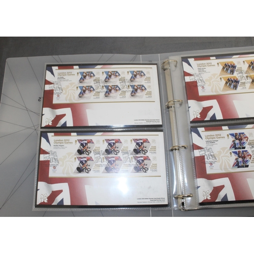 167 - London 2012 Team GB Gold Medal Winners Stamp Collectors Packs in Album