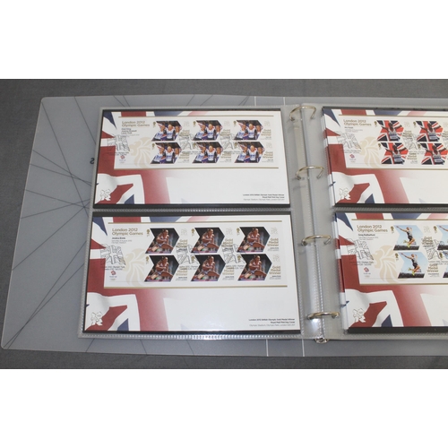 167 - London 2012 Team GB Gold Medal Winners Stamp Collectors Packs in Album