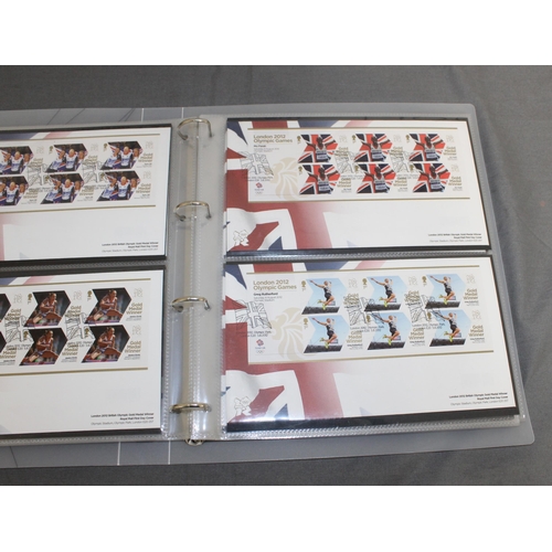 167 - London 2012 Team GB Gold Medal Winners Stamp Collectors Packs in Album