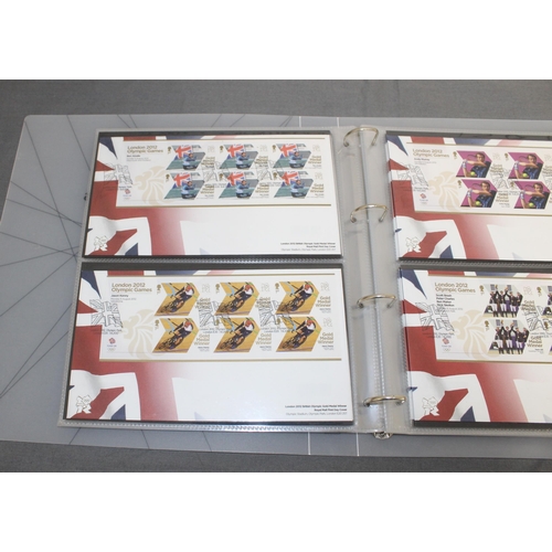 167 - London 2012 Team GB Gold Medal Winners Stamp Collectors Packs in Album