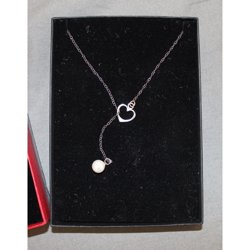 405 - 2 Boxed 925 Silver Necklaces
All Proceeds Go To Charity