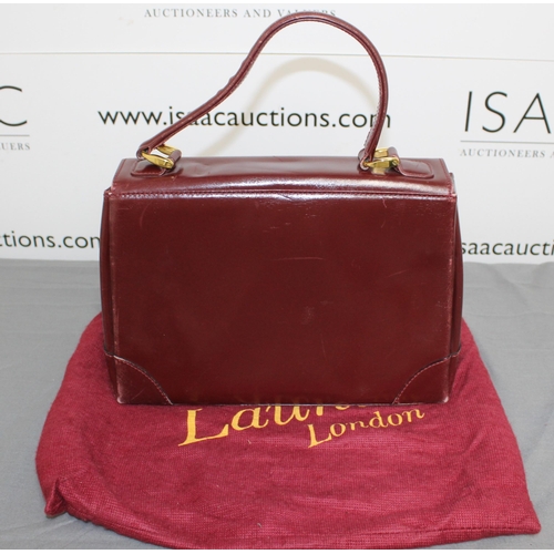 1 - Launer London Vintage Bag
Used Condition
All Proceeds Go To Charity