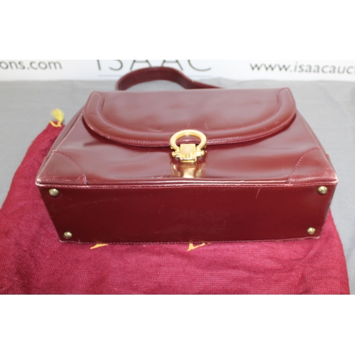 1 - Launer London Vintage Bag
Used Condition
All Proceeds Go To Charity