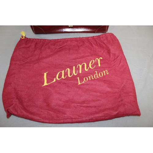 1 - Launer London Vintage Bag
Used Condition
All Proceeds Go To Charity