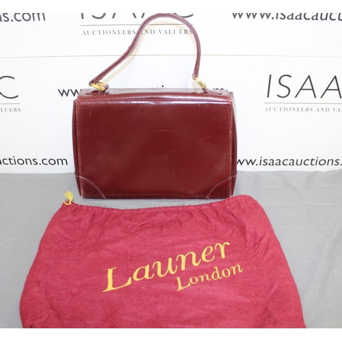 1 - Launer London Vintage Bag
Used Condition
All Proceeds Go To Charity