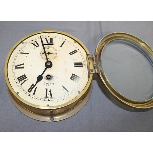 123 - SMITH 8 Day Glass Fronted Brass Cased Ships Clock - 18cm Diameter- Untested
Collection Only