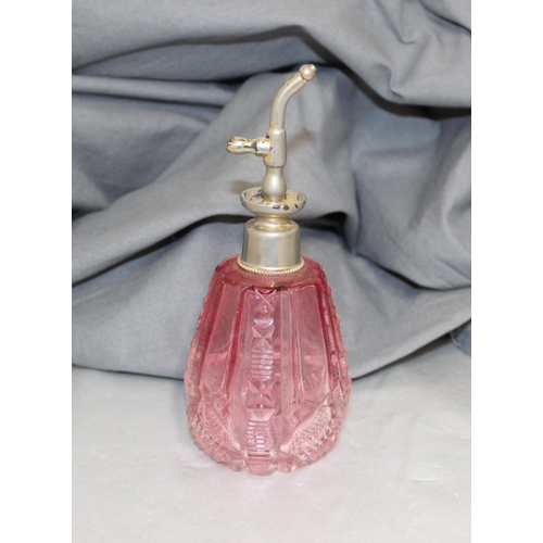 16 - Lady's Pink Glassed Perfume Bottle 
Height 16.5cm