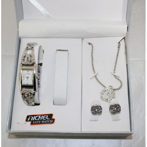 572 - Four Boxed Watches Two Including Matching Jewellery Items
Untested
All Proceeds Go To Charity