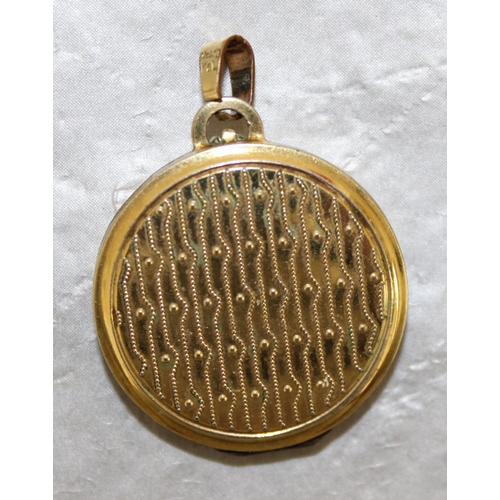 528 - Stamped 14ct RG K & L Locket