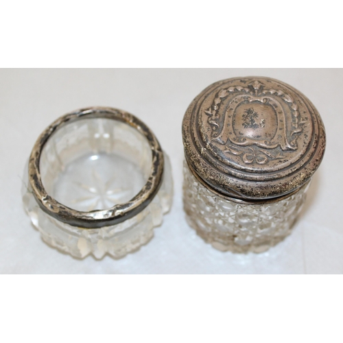 469 - 2 x Silver Hallmarked Topped Glassed Items
Tallest 5cm