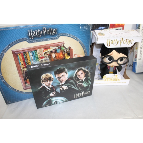 663 - A Collection Of Harry Potter Items Including Puzzles, Plushies, Trivial Pursuit And Collectable Wand... 