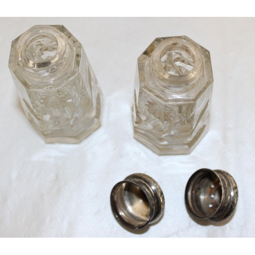 470 - Two Silver Hallmarked Topped Glass Salt & Pepper Pots
Height-9.5cm