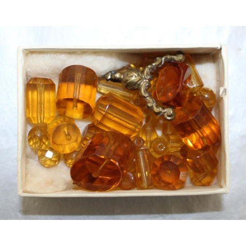 386 - Fob & Some Coloured Amber Jewellery Beads In A Box