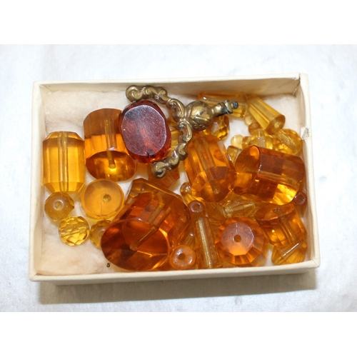 386 - Fob & Some Coloured Amber Jewellery Beads In A Box