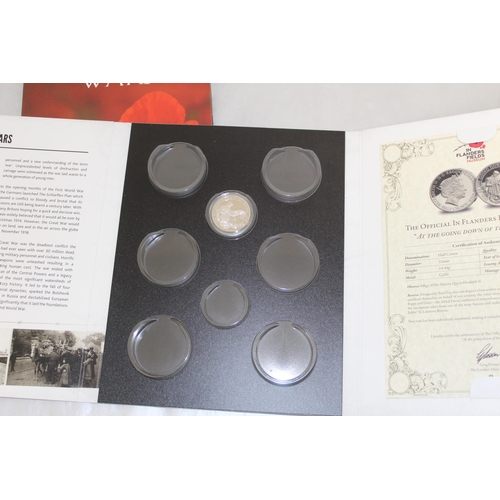 296 - A Selection Of Collectable Coins Including
We Will Remember Them
A Wat To End All Wars 1914-1918
Bat... 