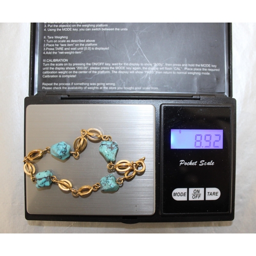 533 - Stamped 750 Gold And Turquoise Bracelet
In A Box
Total Weight 8.92g