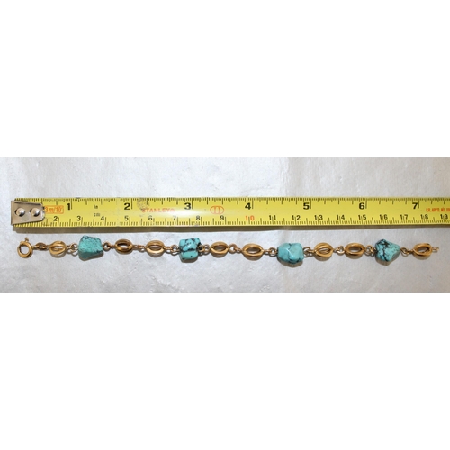 533 - Stamped 750 Gold And Turquoise Bracelet
In A Box
Total Weight 8.92g