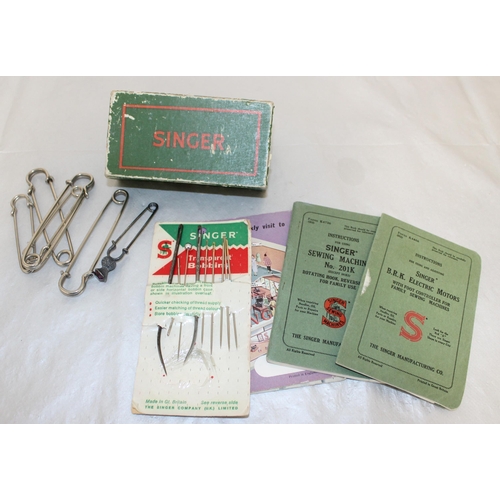 131 - Singer Sewing Machine Accessories And Large Pins