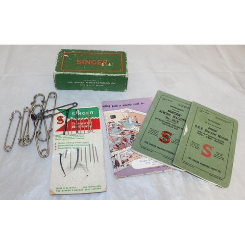 131 - Singer Sewing Machine Accessories And Large Pins