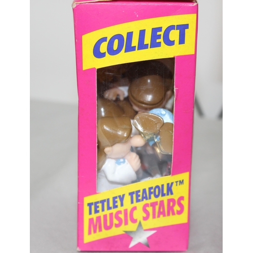 132 - A Quantity Of Boxed Collectable The Tetley Tea Folk And Houses