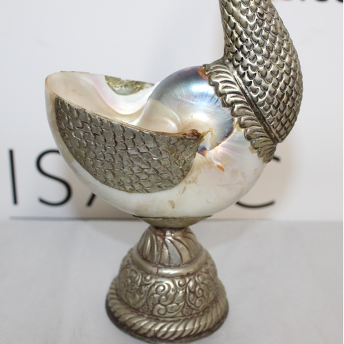 140 - A Unique Bird Ornament Shell, Nautilus
Height 24cm
COLLECTION ONLY