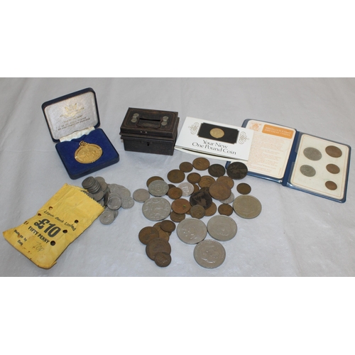 325 - A Quantity Of Collectable Coins/Commemorative/Money Tin/Money Bag