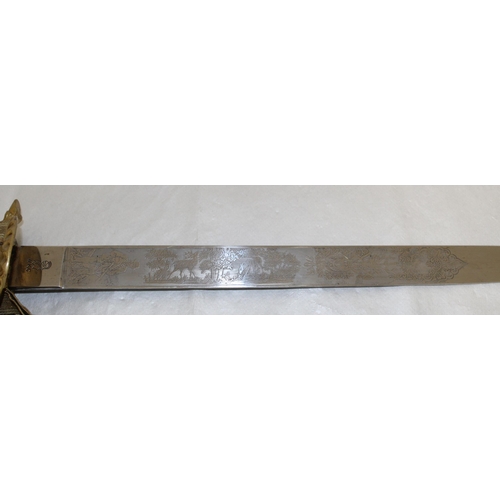 205 - An Imperial forestay cutlass with triple etched blade by W.K.C.

An exceptional example with portepe... 