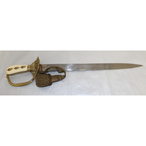 205 - An Imperial forestay cutlass with triple etched blade by W.K.C.

An exceptional example with portepe... 