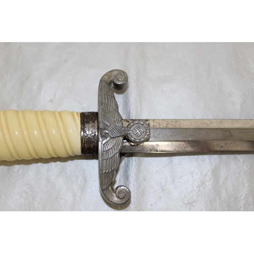 219 - An Army (HEER) Officer's Dress Dagger, adopted 1935. This example with white grip and set of correct... 