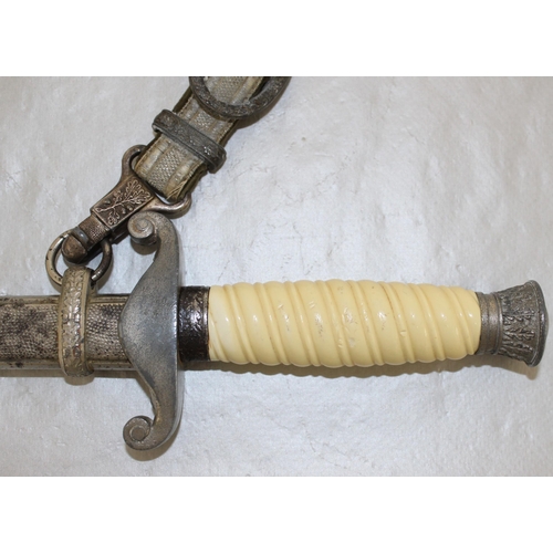 219 - An Army (HEER) Officer's Dress Dagger, adopted 1935. This example with white grip and set of correct... 