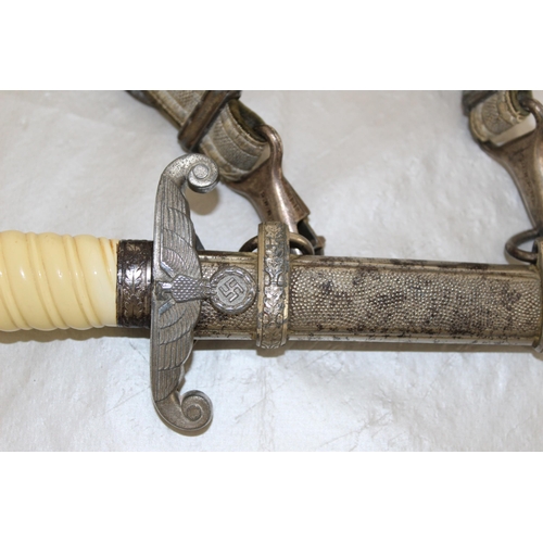 219 - An Army (HEER) Officer's Dress Dagger, adopted 1935. This example with white grip and set of correct... 