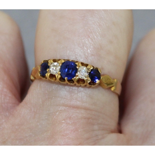 563 - Stamped 18 Gold Diamond & Sapphire Ring  - Size R - Total Weight 2.34gms