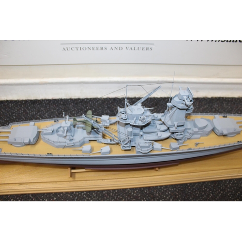 677 - Cased Battleship on Stand within Perspex Case
Case Length 103cm
Height 30 cm
COLLECTION ONLY