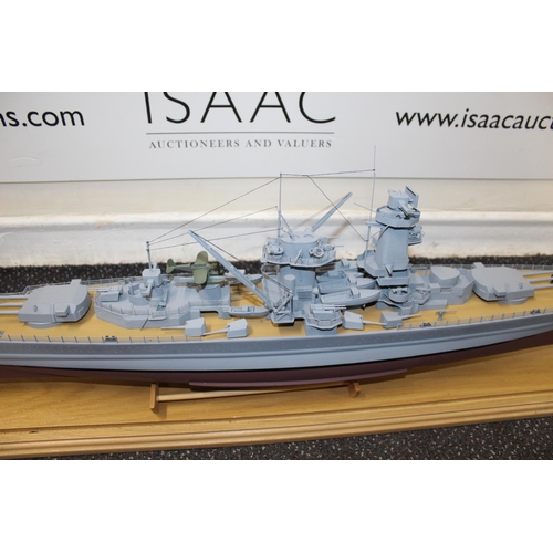 677 - Cased Battleship on Stand within Perspex Case
Case Length 103cm
Height 30 cm
COLLECTION ONLY