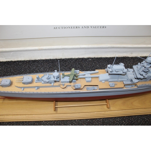 678 - Cased Battleship on Stand within Perspex Case
Case Length  100cm
Height 30cm
COLLECTION ONLY