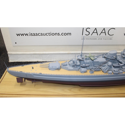 680 - Cased Battleship on Stand within Perspex Case
Case length 131.5cm
Height 35cm
COLLECTION ONLY