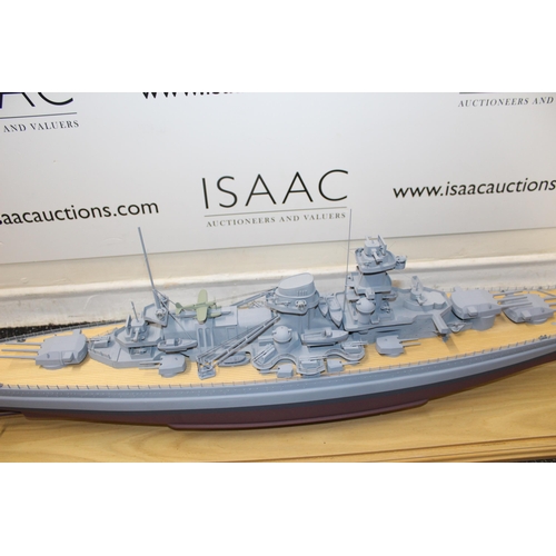 680 - Cased Battleship on Stand within Perspex Case
Case length 131.5cm
Height 35cm
COLLECTION ONLY