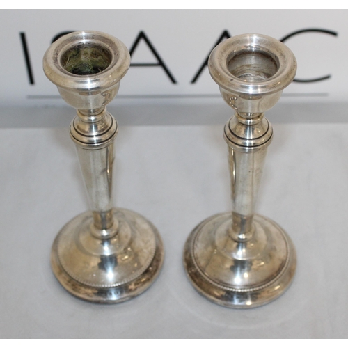 499 - A Pair Of Silver Hallmarked Candle Sticks
Height 15.5 cm