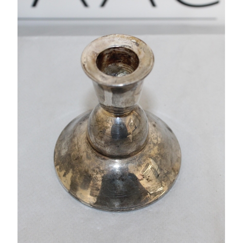 503 - Silver Candle Stick Holder
Height 8.5cm