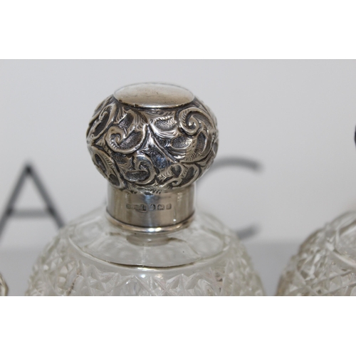 512 - 3 x Silver hallmarked Topped Glass Perfume Bottles