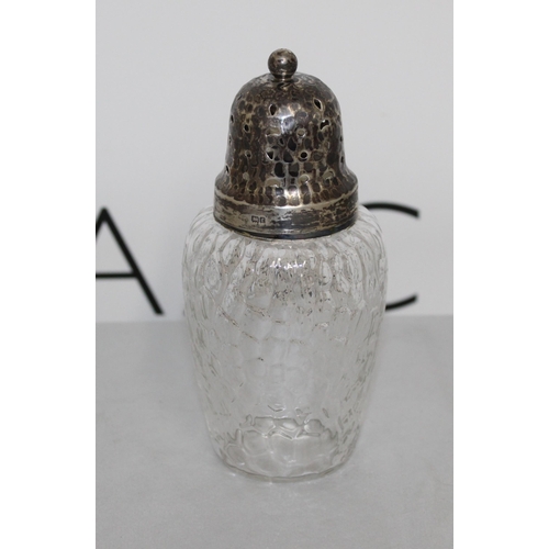 515 - Silver Hallmarked Topped Glass Sugar Shaker 
Height 14cm 
COLLECTION ONLY