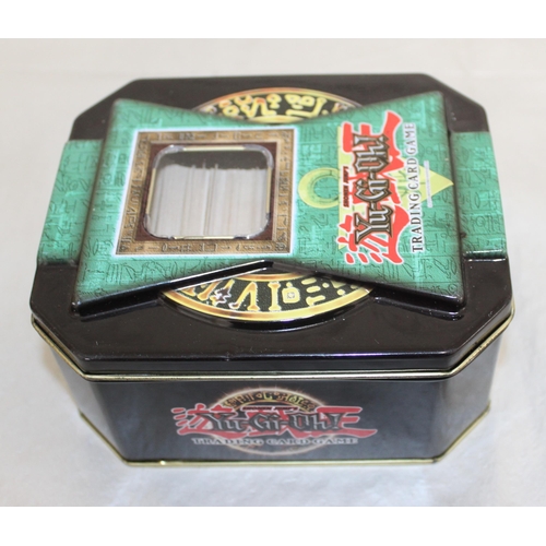 684 - COLLECTABLE YU-GI-OH! TRADING CARDS IN TINS