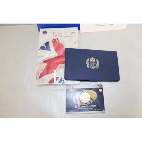 329 - A Collection Of Commemorative Coins/Collectable Coin Packs