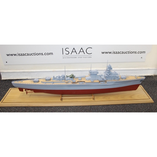 780 - Cased Battleship on Stand within Perspex Case
Case Length  100cm
Height 30cm
COLLECTION ONLY