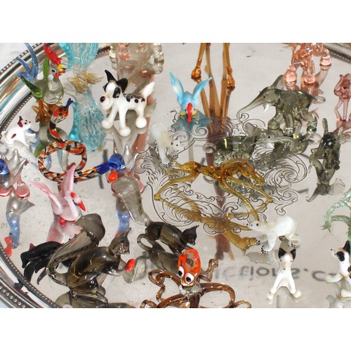 98 - A Collection Of Glass Ornamental Animals 
Tallest 16.5cm 
TRAY NOT INCLUDED
COLLECTION ONLY