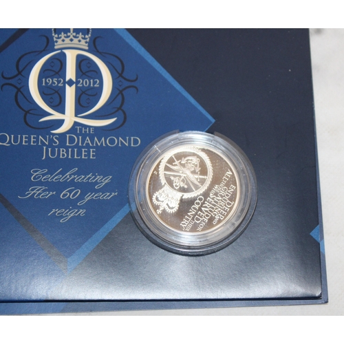 389 - Selection Of Collectable Coins Inc-
1982 UK Uncirculated Coin Collection
2012 The Queen's Diamond Ju... 