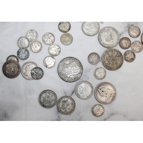 383 - A Selection Of Coins Including Florins, Shillings, Sixpence And Threepence
Weight 200g